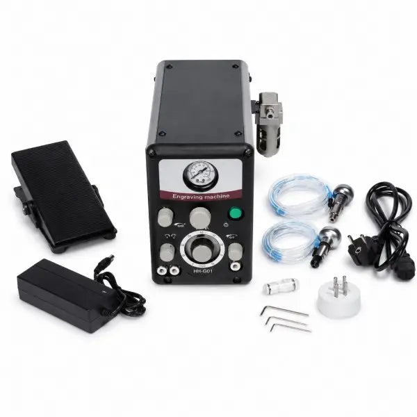 Pneumatic jewelry engraving machine complete set with foot pedal, dual handpieces, air tubes, power adapter, and accessories on white background