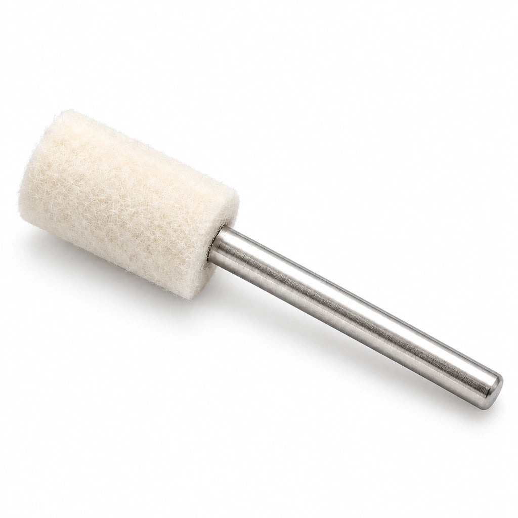 Mounted cylindrical white wool felt polishing point with metal shank on a white background